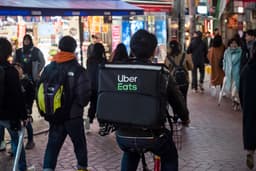 Uber thâu tóm Delivery Hero với giá 14,8 tỷ USD: Cú bắt tay định hình lại bản đồ giao vận toàn cầu